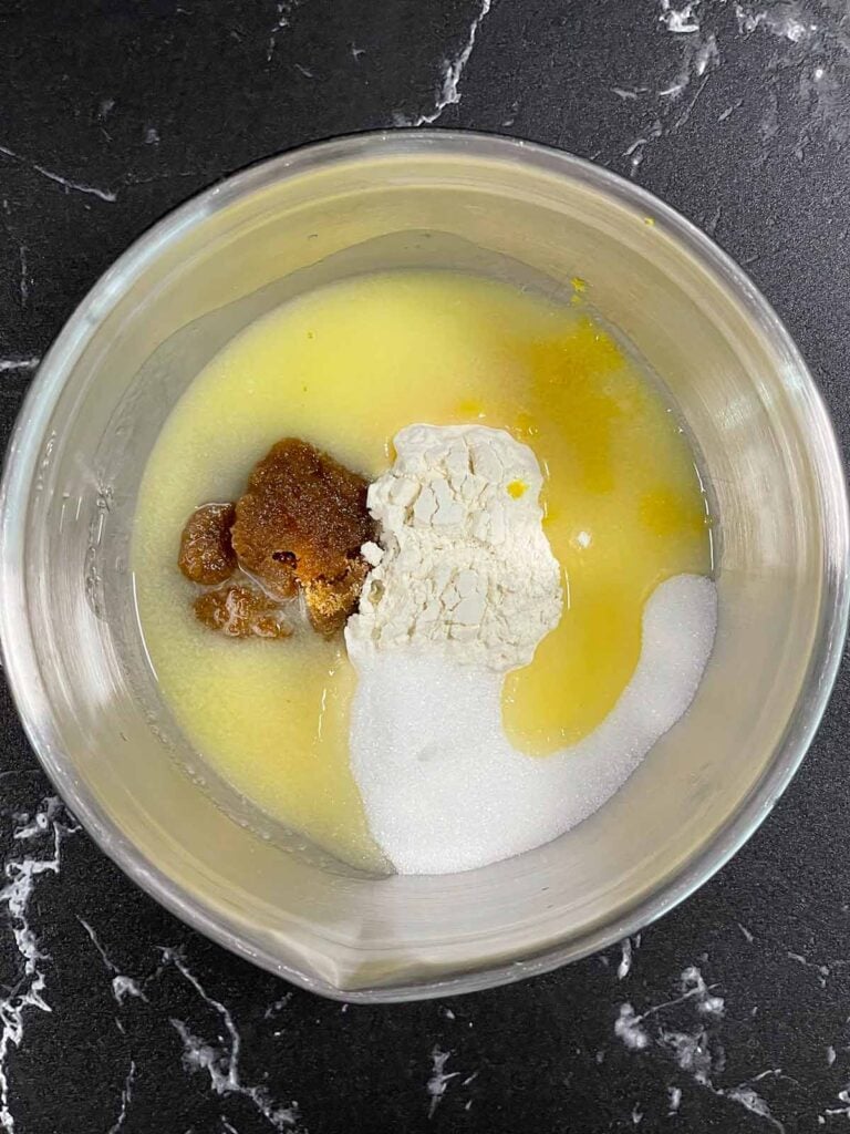 Lemon streusel ingredients in a medium metal mixing bowl.