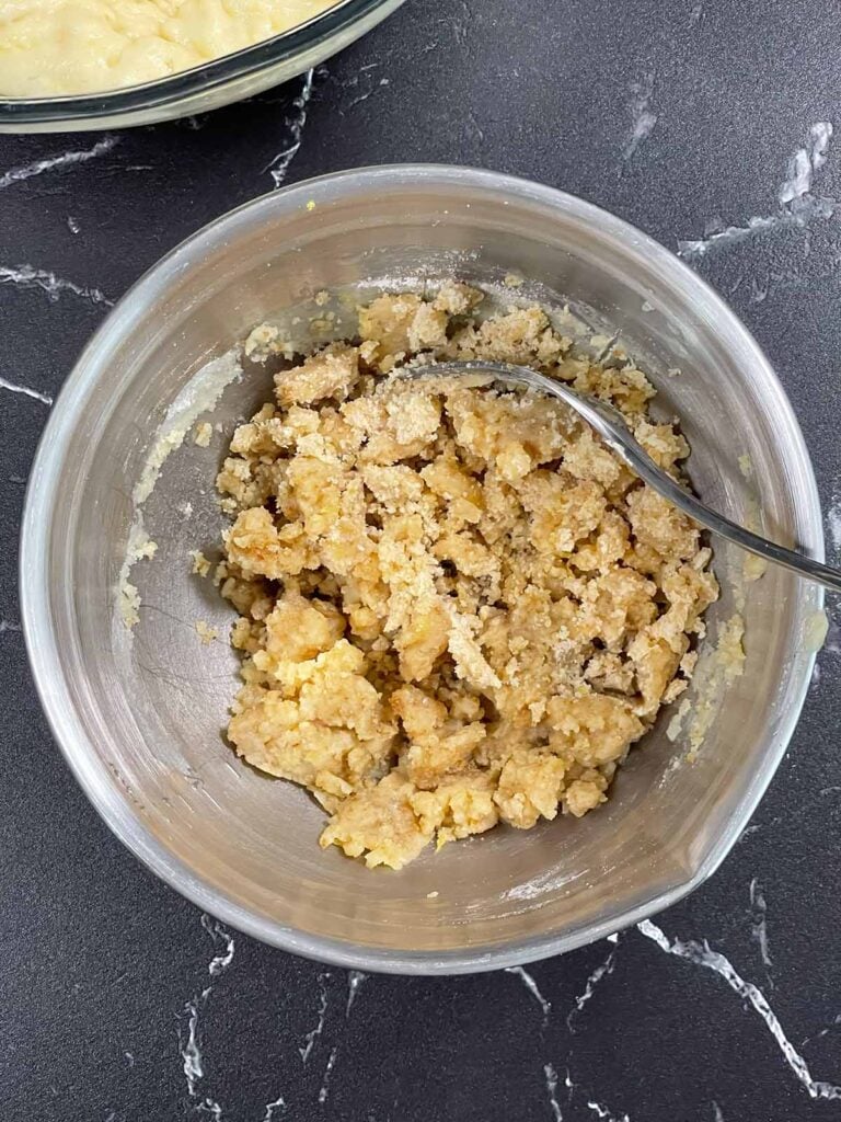 Buttery lemon streusel topping mixed until crumbly with sugar and flour.
