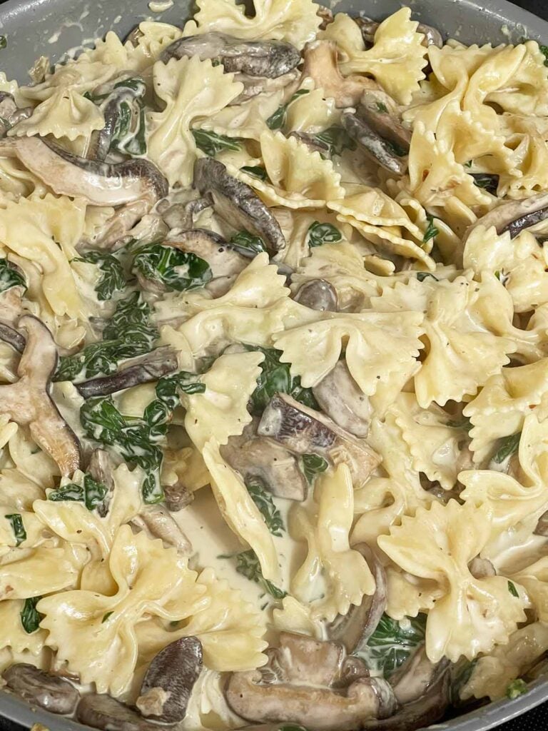 Spinach and Mushroom Pasta in a skillet.