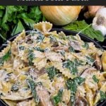 Spinach and Mushroom Pasta in a dark bowl.