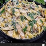Spinach and Mushroom Pasta in a dark bowl.