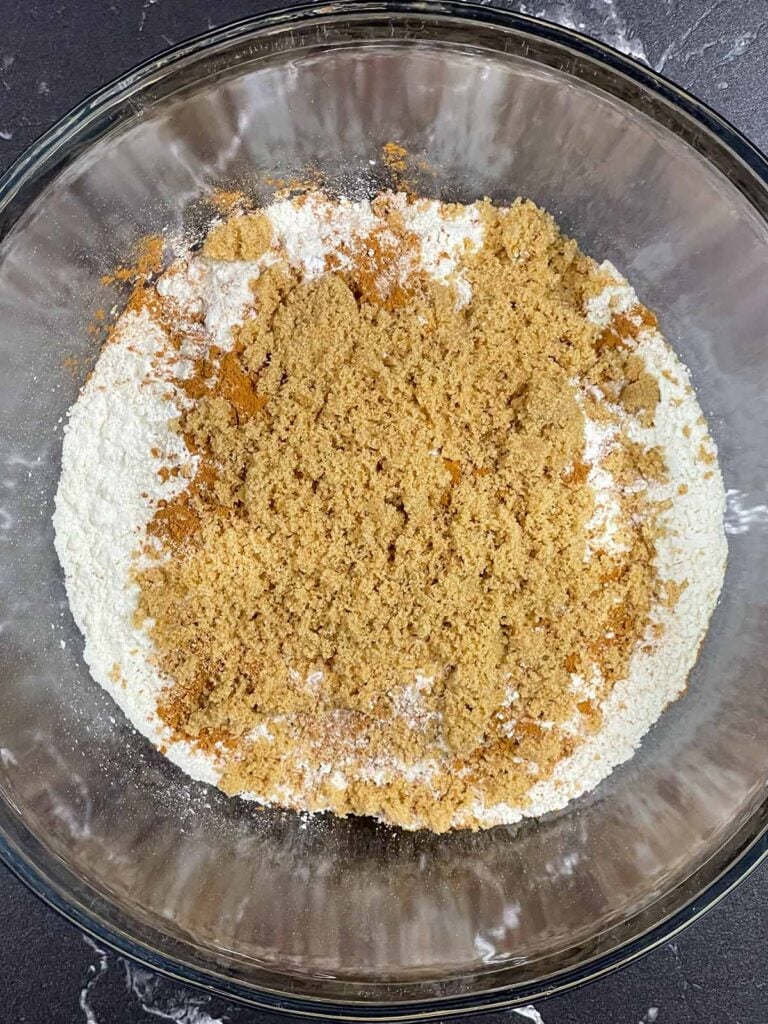 Dry ingredients in a large mixing bowl for carrot cake scones recipe.
