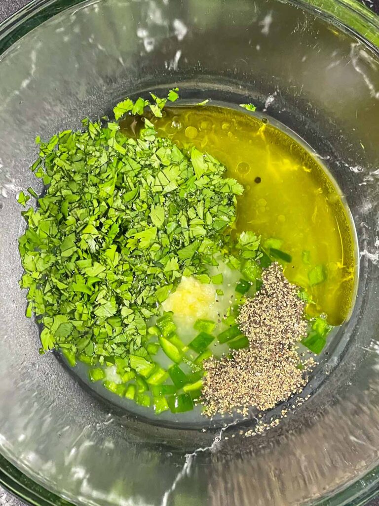 Marinade ingredients in a glass bowl.