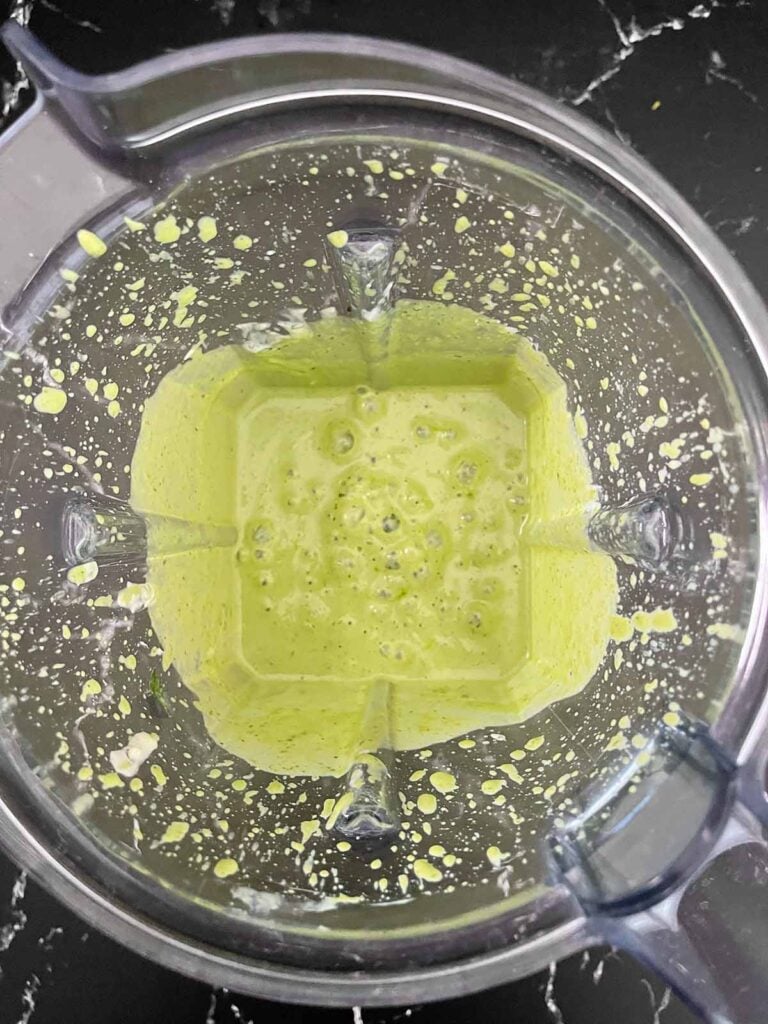 Green Goddess Salad dressing mixed in a blender.