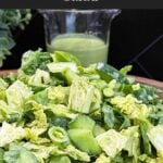 Green Goddess Salad served in a bowl with Napa cabbage, spinach, arugula, cucumbers, snow peas, and creamy herb dressing.