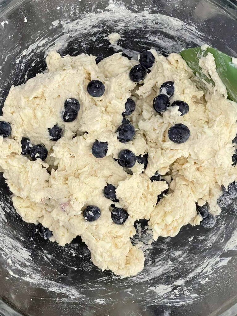 Fresh blueberries gently folded into the biscuit dough before shaping.