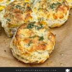 Freshly baked cheddar dill biscuits brushed with garlic dill butter.