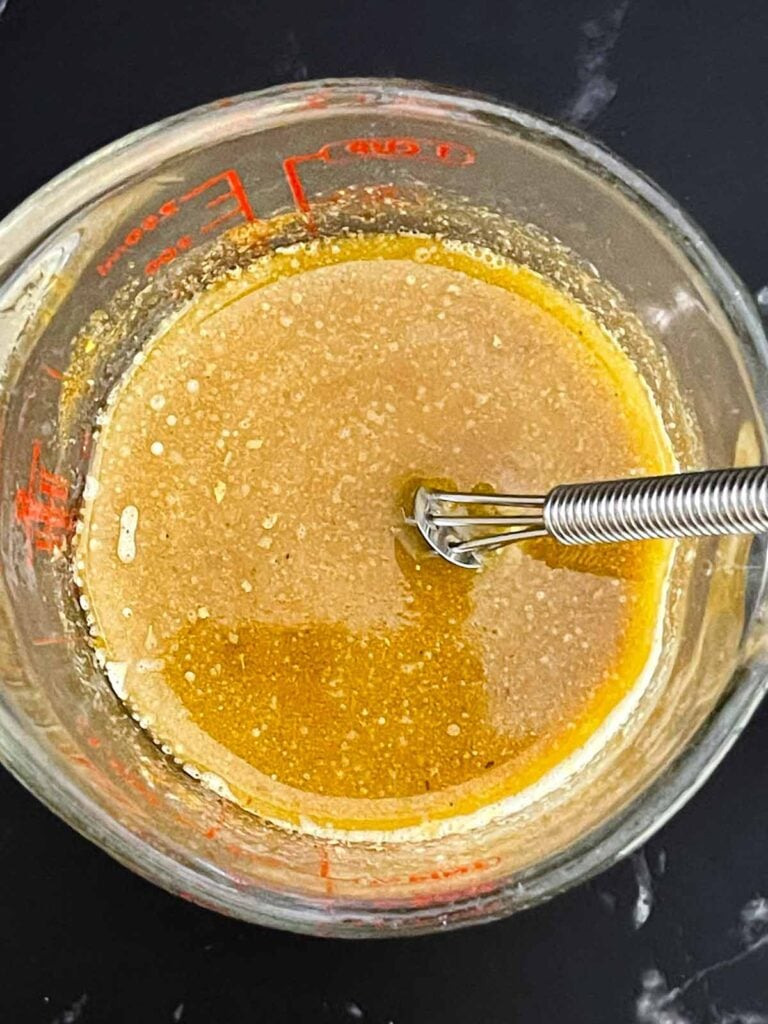 Melted butter mixed with Old Bay seasoning, Worcestershire sauce, garlic powder, and onion powder.