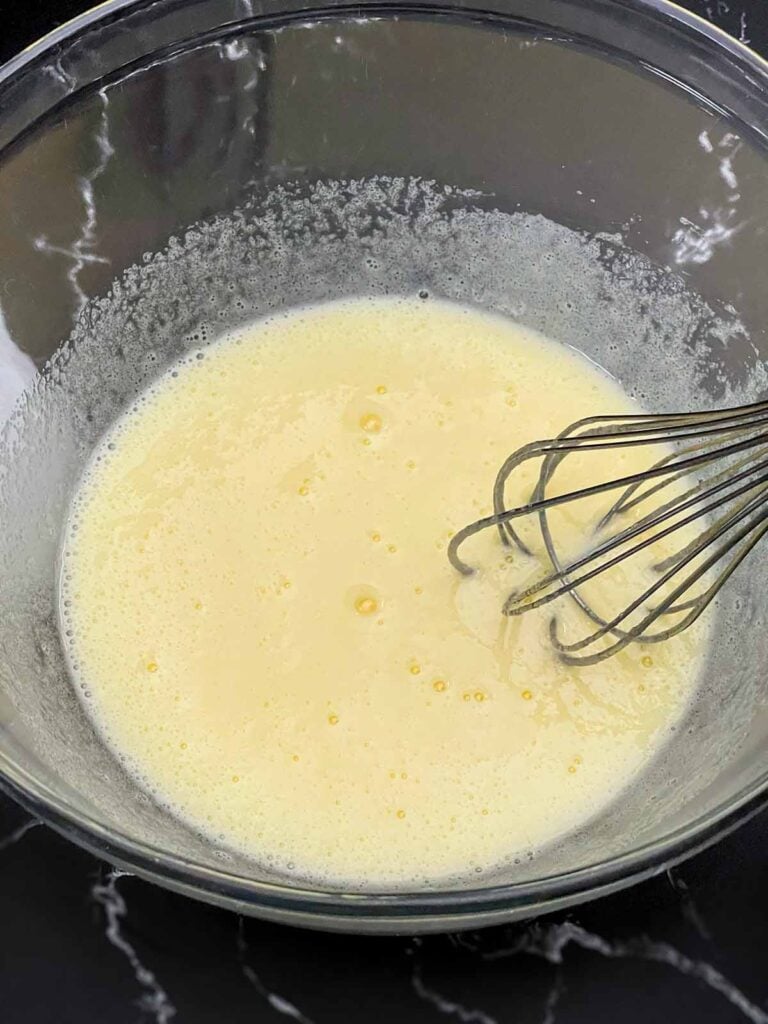 Eggs and granulated sugar whisked together until thick and pale.