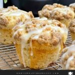Peach muffins made with fresh peaches, peach preserves, cinnamon streusel, and peach glaze.