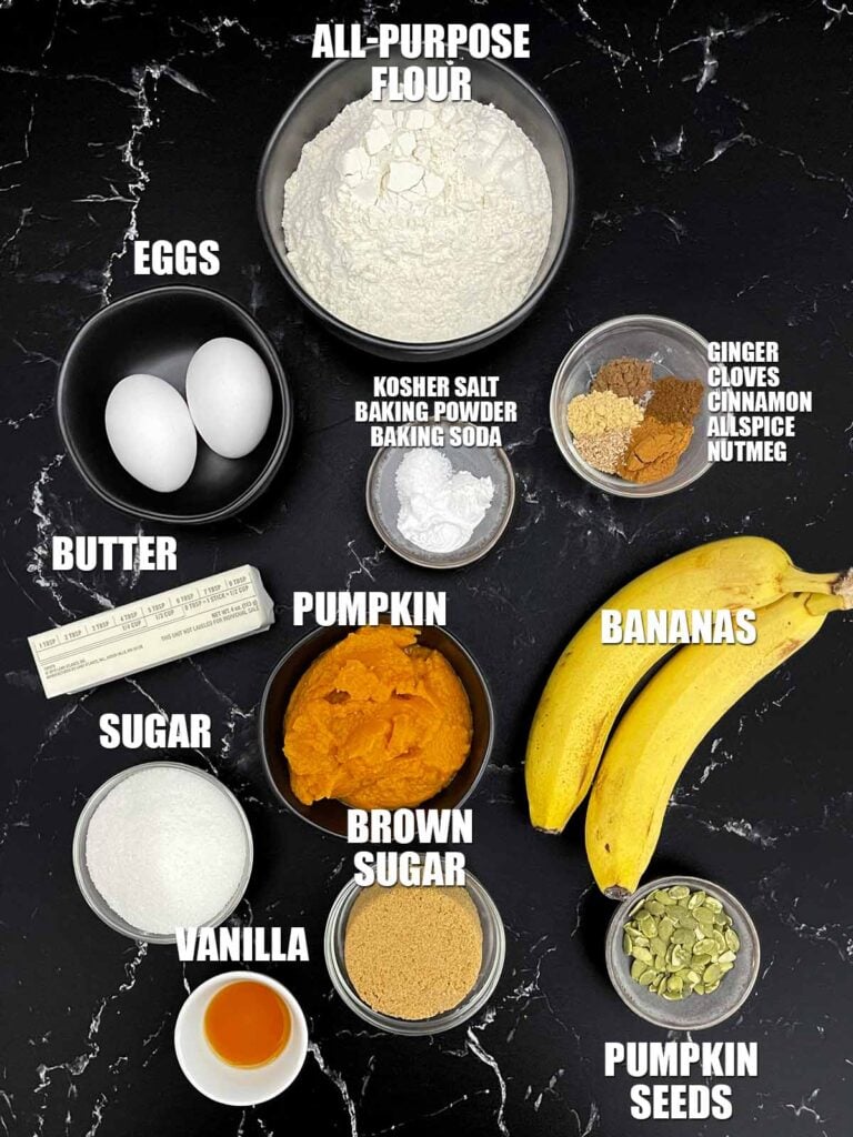 ngredients for pumpkin banana bread including flour, pumpkin puree, ripe bananas, eggs, butter, sugars, spices, and pumpkin seeds.