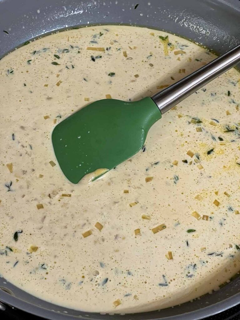 Creamy Dijon sauce whisked until smooth.