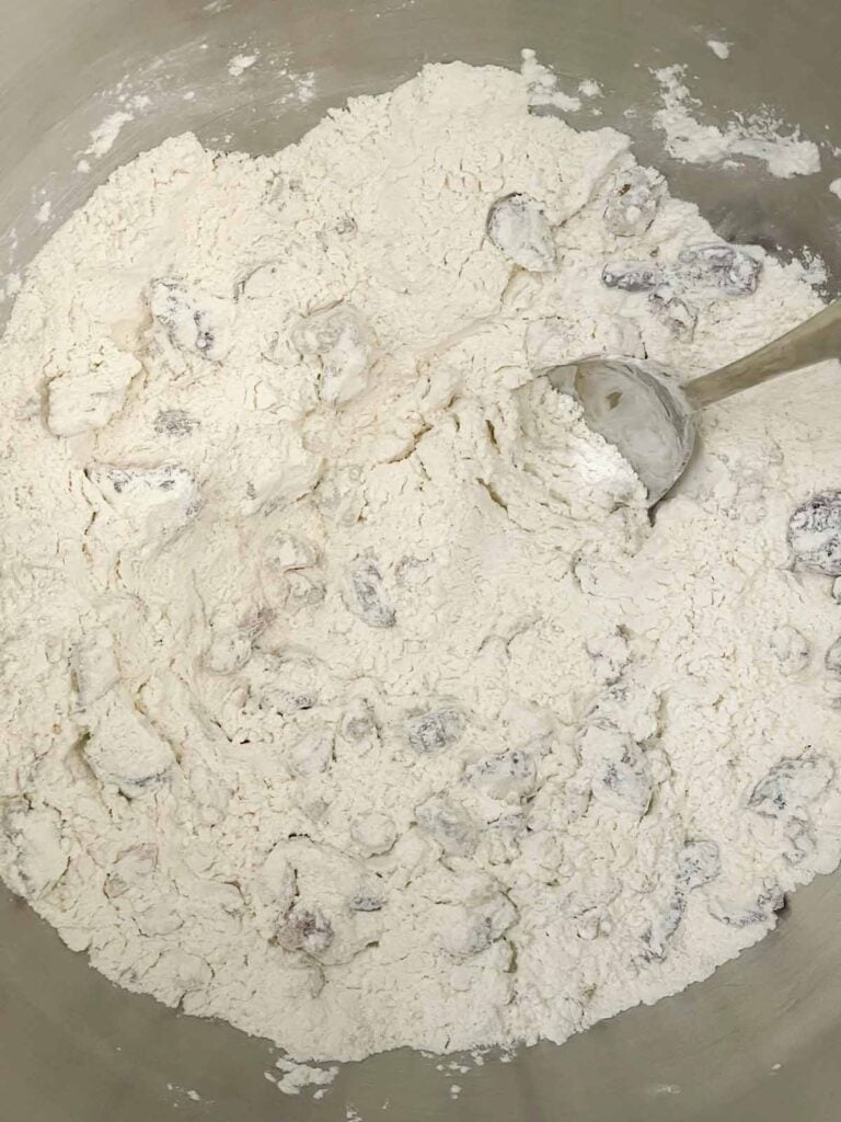 Dry ingredients combined in the stand mixer bowl.