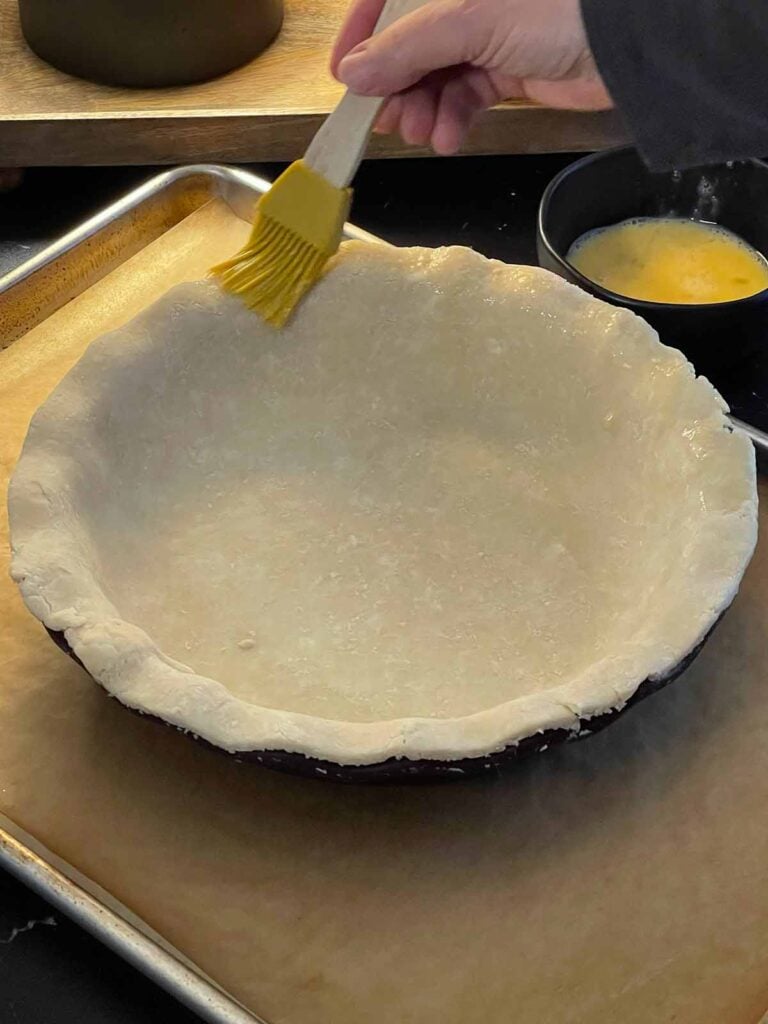 Unbaked pie crust fitted into a 9-inch deep-dish pie plate.